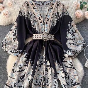 Elegant Black and Cream Paisley Mini Dress
